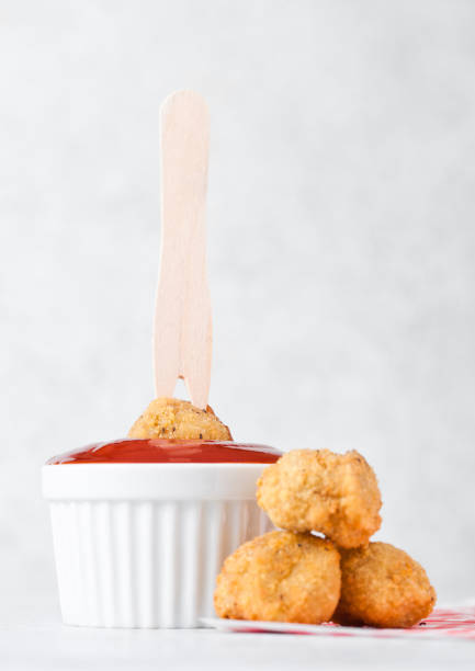 istock Fried crispy chicken popcorn with ketchup sauce 931703038
