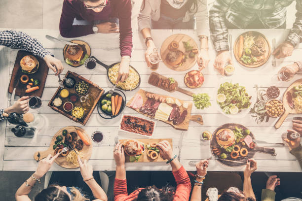 istock Group of people having meal togetherness dining 931705018