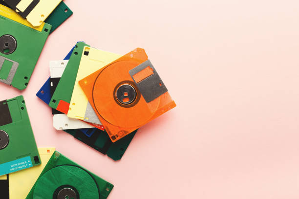 istock Retro floppy disks isolated on pink background 931710480