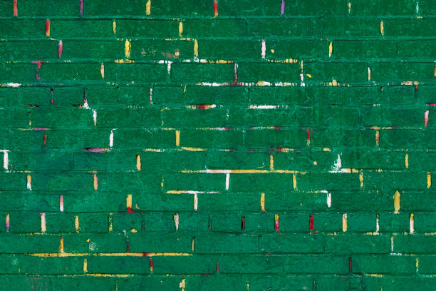 istock Green painted wall with yellow lines 931717314