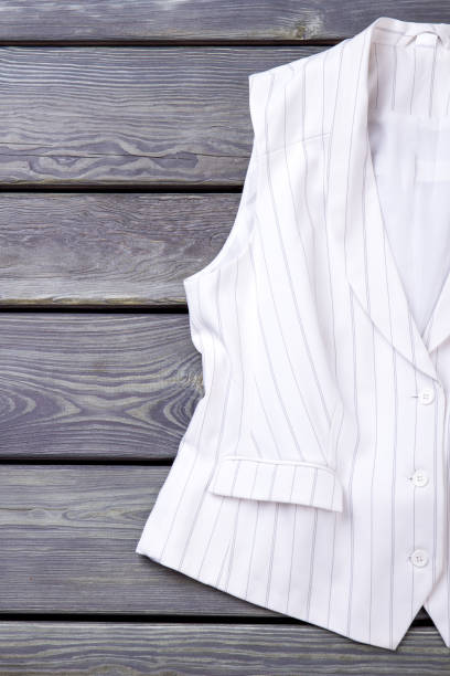 istock Close up white sleeveless business jacket. 931721098