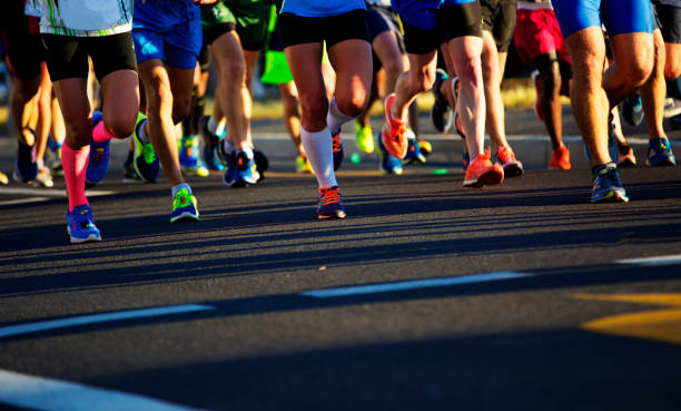 istock Runners legs on the road 931721672