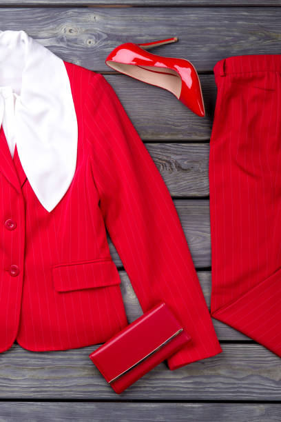 istock Red feminine suit, shoe and wallet. 931724704