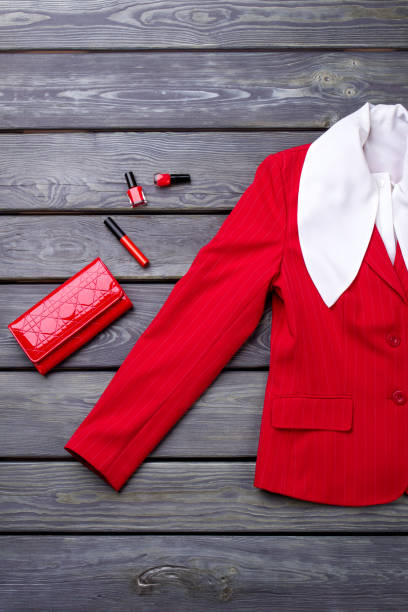 istock Top view red blazer sleeve and accessories. 931725020