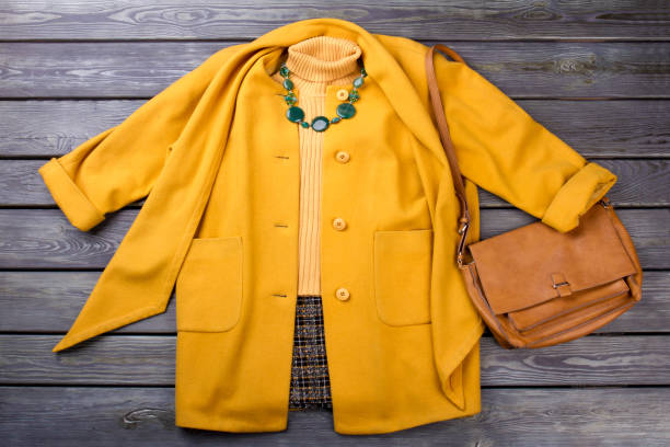 istock Yellow winter garment and accessories. 931728858