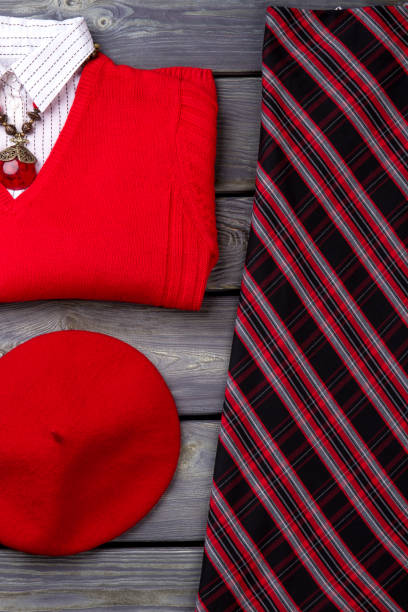 istock Close up top view red female clothing set. 931729542