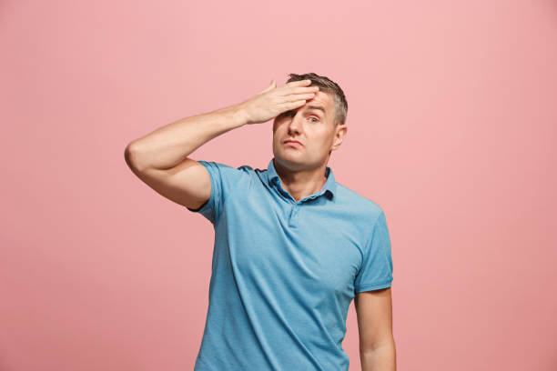 istock Young serious thoughtful businessman. Doubt concept 931729742