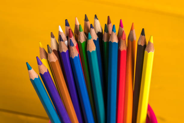 istock color pencils in metal grid container on the yellow board 931732332
