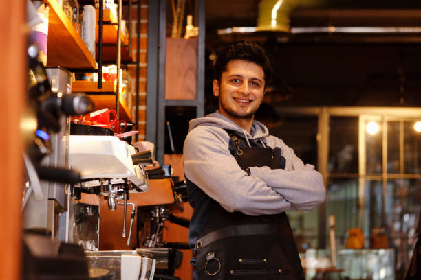istock Barista Making Coffee For Customers At Cafe 931733894
