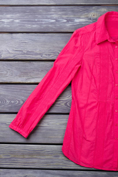 istock Pink shirt sleeve, flat lay. 931733956