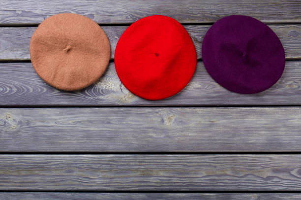istock Row of colourful berete hats. 931737672