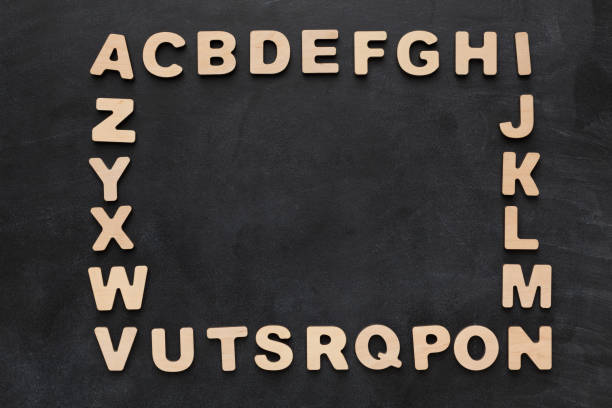 istock Wooden english letters on black background 931744226
