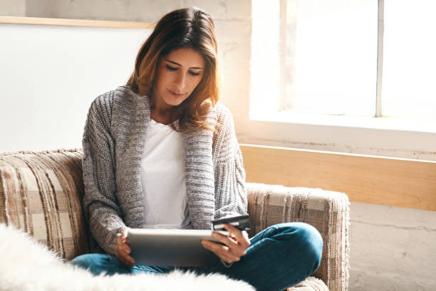 istock Turning sofa day into a shopping day 931748528