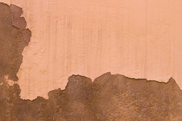 istock Damaged Painted Beige Brown Old Wall Background Texture 931749054