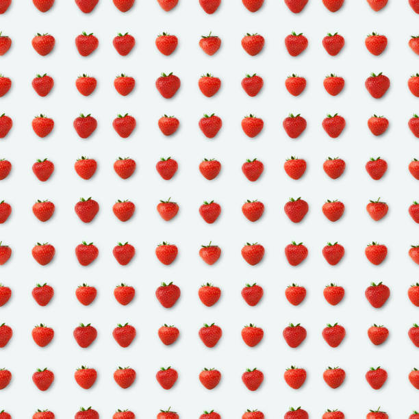 Single ripe strawberry isolated on white background.