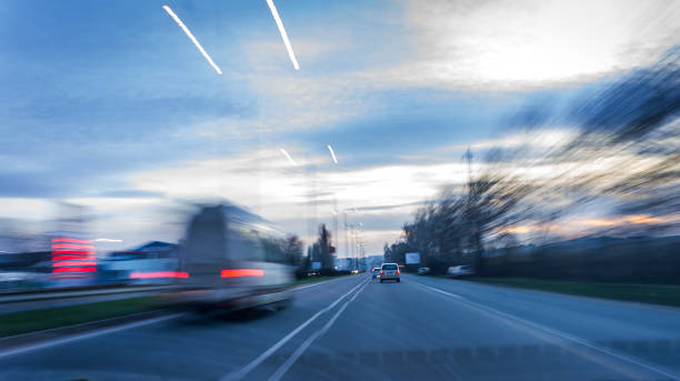 istock urban night landscape on a road with smashed high-speed cars. 931752976