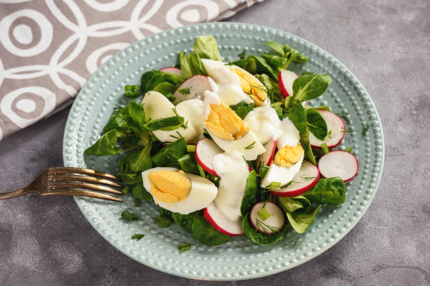 istock Radish salad with boiled eggs and yogurt. 931757140