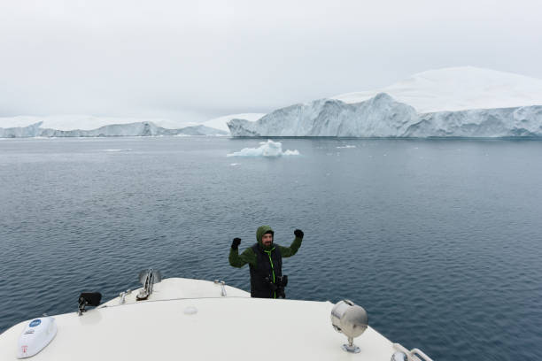 istock People in a boat on arctic ocean in Greenland 931758966