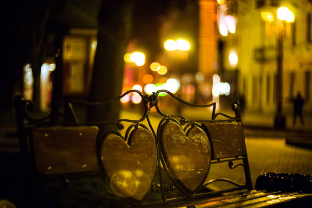 istock evening landscape with lonely bench in the night park 931761140
