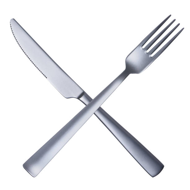 istock Silver matted metal knife and fork crossed 931761786
