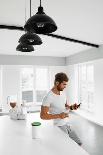 istock Healthy Eating. Man Drinking Shake After Workout. Nutrition 931764722