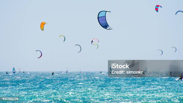 People Doing Kitesurfing And Windsurfing Stock Photo - Download Image Now - Kiteboarding, Windsurfing, Kiteboard