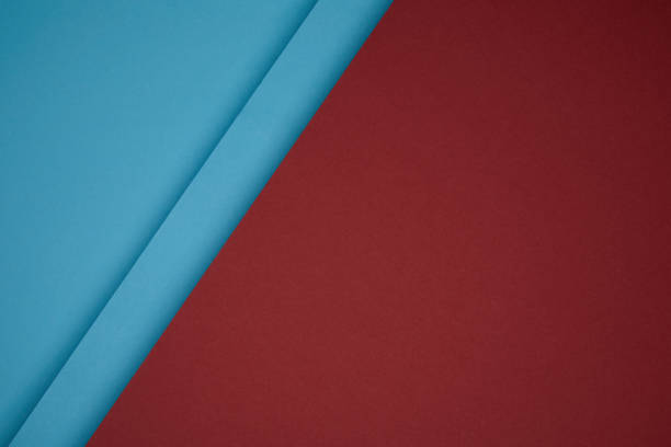 close up view of geometric background from red and blue colored paper