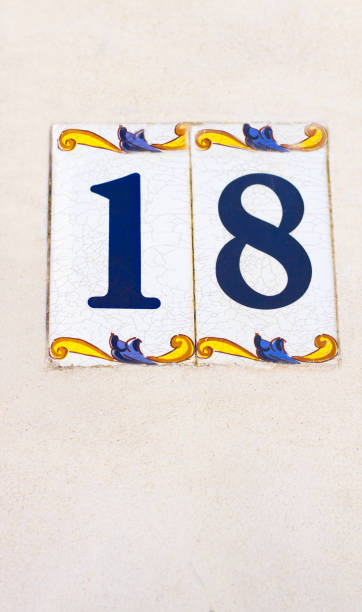 istock Italy: Ceramic Number 18 Street Address Tile (Close-Up) 931775474