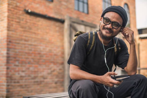 istock Man listening music 931779152
