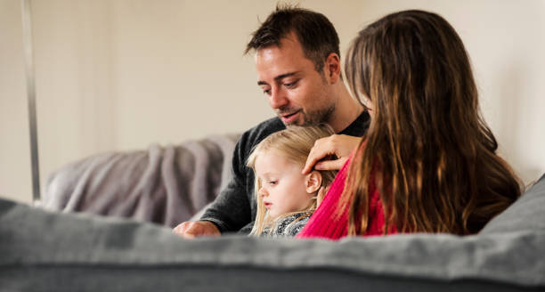 istock Young family relaxing with digital tablet 931788686