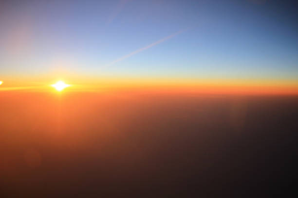 istock the sunset above clouds at the plane 931790802
