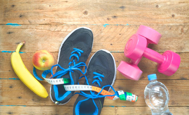 istock Fitness workout, reducing weight for the springtime, concept,free copy space,flat lay 931792888