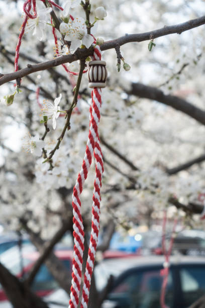 istock Traditional spring bracelet on a blossoming cherry branch. 931800508