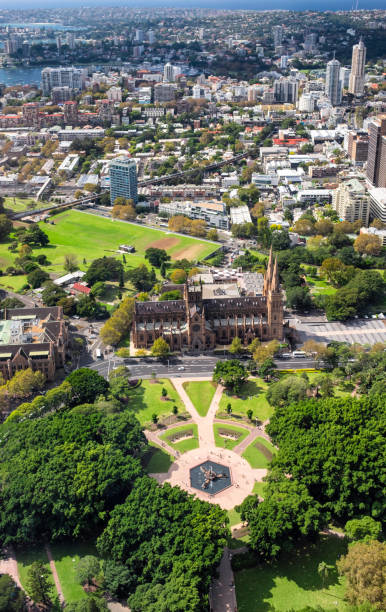 St Mary's Cathedral In Sydney Elevated view of St Mary's Cathedral in Sydney. hyde park sydney stock pictures, royalty-free photos & images