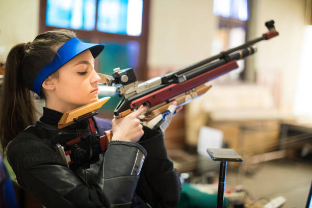 istock Woman With a Sporting Gun 931809276