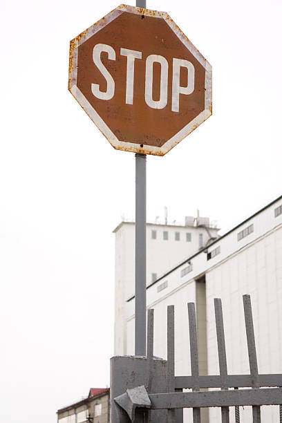 Factory with a stop sign stock photo