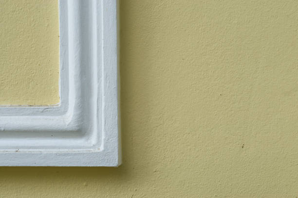 istock close up picture frame on the yellow wall. 931815136