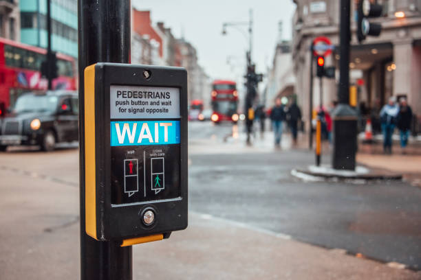 istock Wait sign for pedestrians in London 931816944