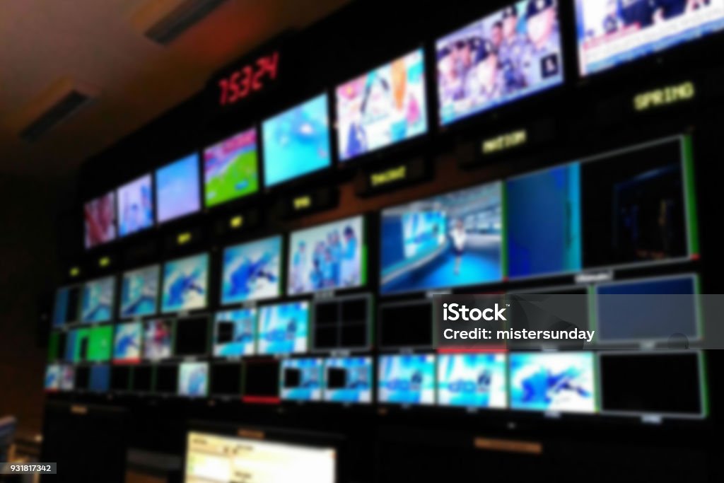 Blurred picture video switch of Television Broadcast, working with video and audio mixer, control broadcasts in recording studio. Home Video Camera Stock Photo