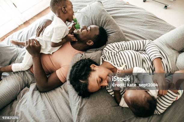 Connected Parenting Stock Photo - Download Image Now - Family, Baby - Human Age, African-American Ethnicity