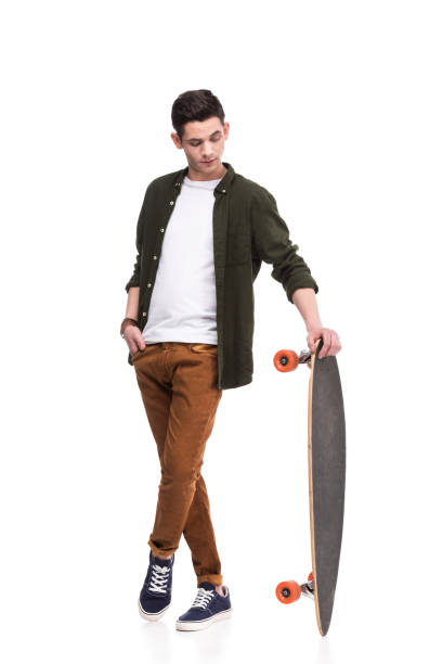 istock skateboarder standing with longboard isolated on white 931823682