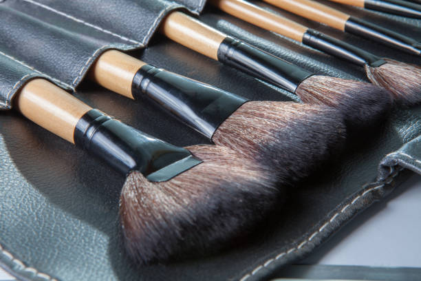 istock Set of  makeup brushes in row black leather cover case 931823792