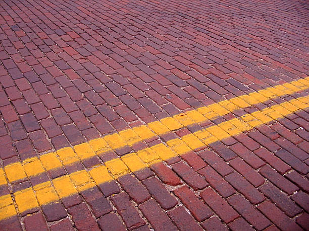 Brick Street Detail of brick paved street that's the main drag through Oxford, Ohio. If you're in the area it's worth a drive through this neat little college town. Would enjoy knowing how you used this photo. oxford ohio photos stock pictures, royalty-free photos & images