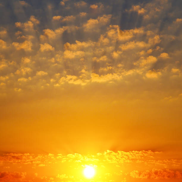 istock Cloudy sky and bright sunrise over the horizon. 931839996