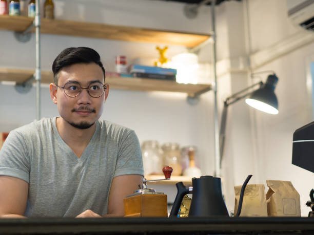 istock Man being barista and own a small coffee shop. 931840084