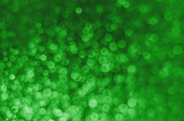 istock abstract gorgeous bright green bokeh background. 931853440