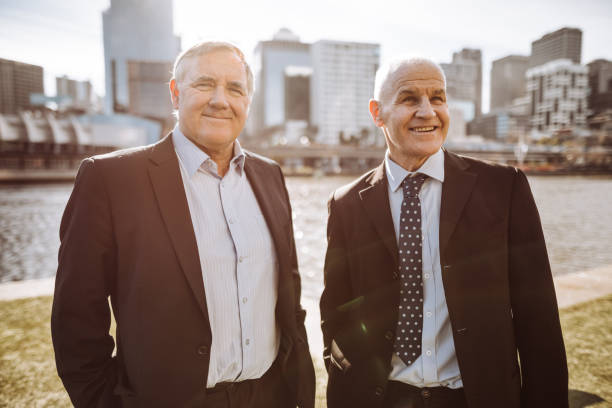 istock business colleagues with a document standing in melbourne 931867814