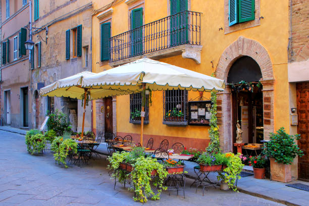 Street cafe in Montalcino town, Val d'Orcia, Tuscany, Italy. stock photo