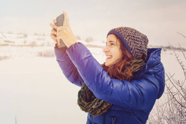 istock Woman taking photo by Smartphone 931894898