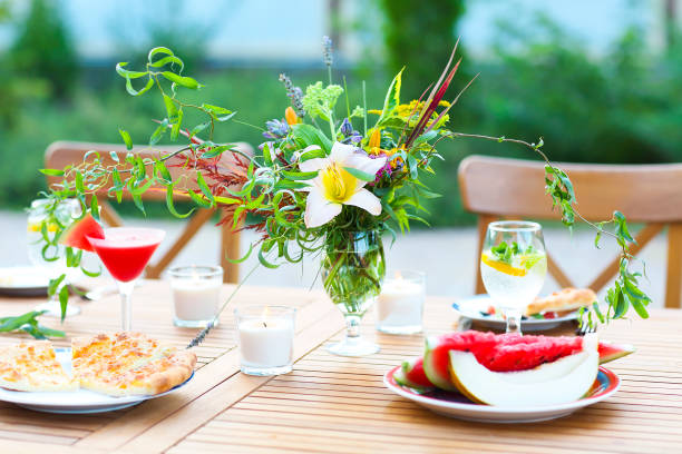 Summer outdoor party decorated with flowers